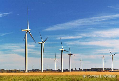 Wolfe Island Wind Project_15421.jpg - Just a few of the 86 wind turbines that comprise this 197.8 MW wind farm, each turbine rated at 2,300 kilowatts.  Photographed on Wolfe Island, Ontario, Canada. Wolfe Island (44°10′N 76°25.5′W) is the largest of the famed 1,000 Islands.